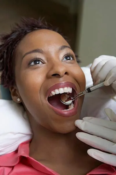 woman getting dental care at Comprehensive Dentistry in Saline, MI