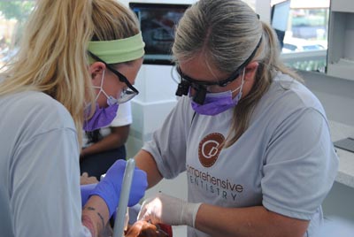 the Comprehensive Dentistry team providing volunteer dental care