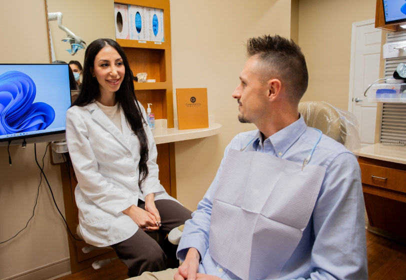 Ypsilanti, MI dentist - Dr. Hammoud of Comprehensive Dentistry talking with a patient